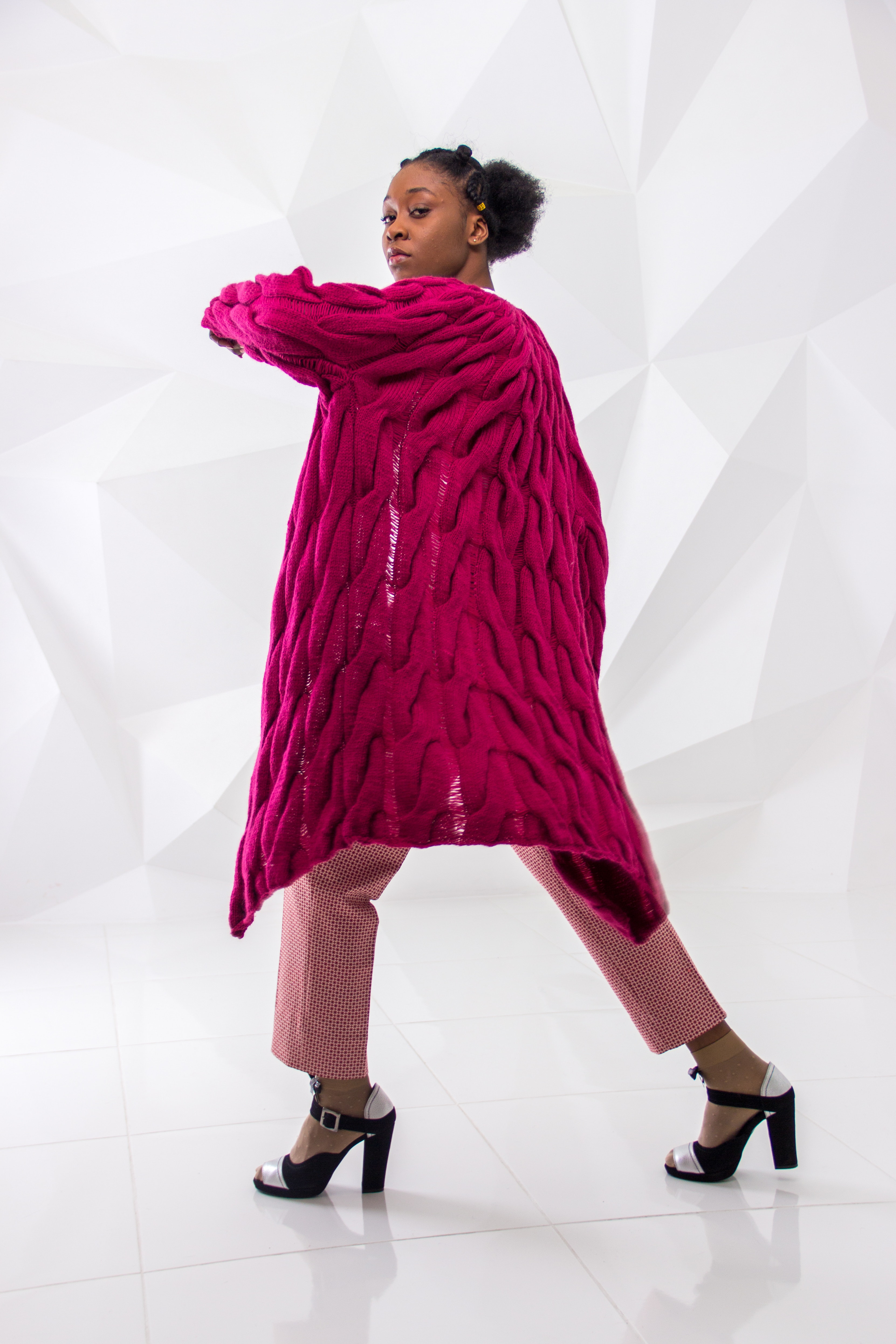 Woman wearing pink knitted coat photo