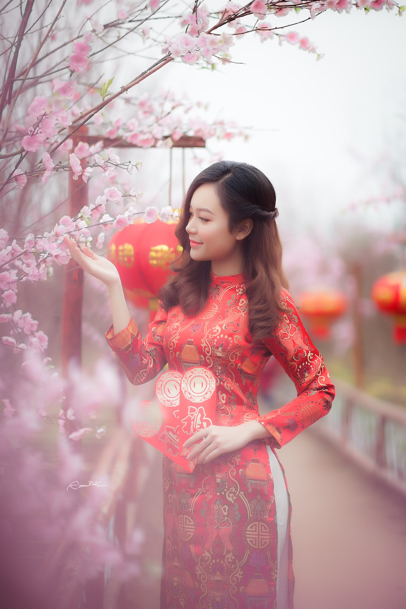 Woman wearing red chinese traditional dress photo
