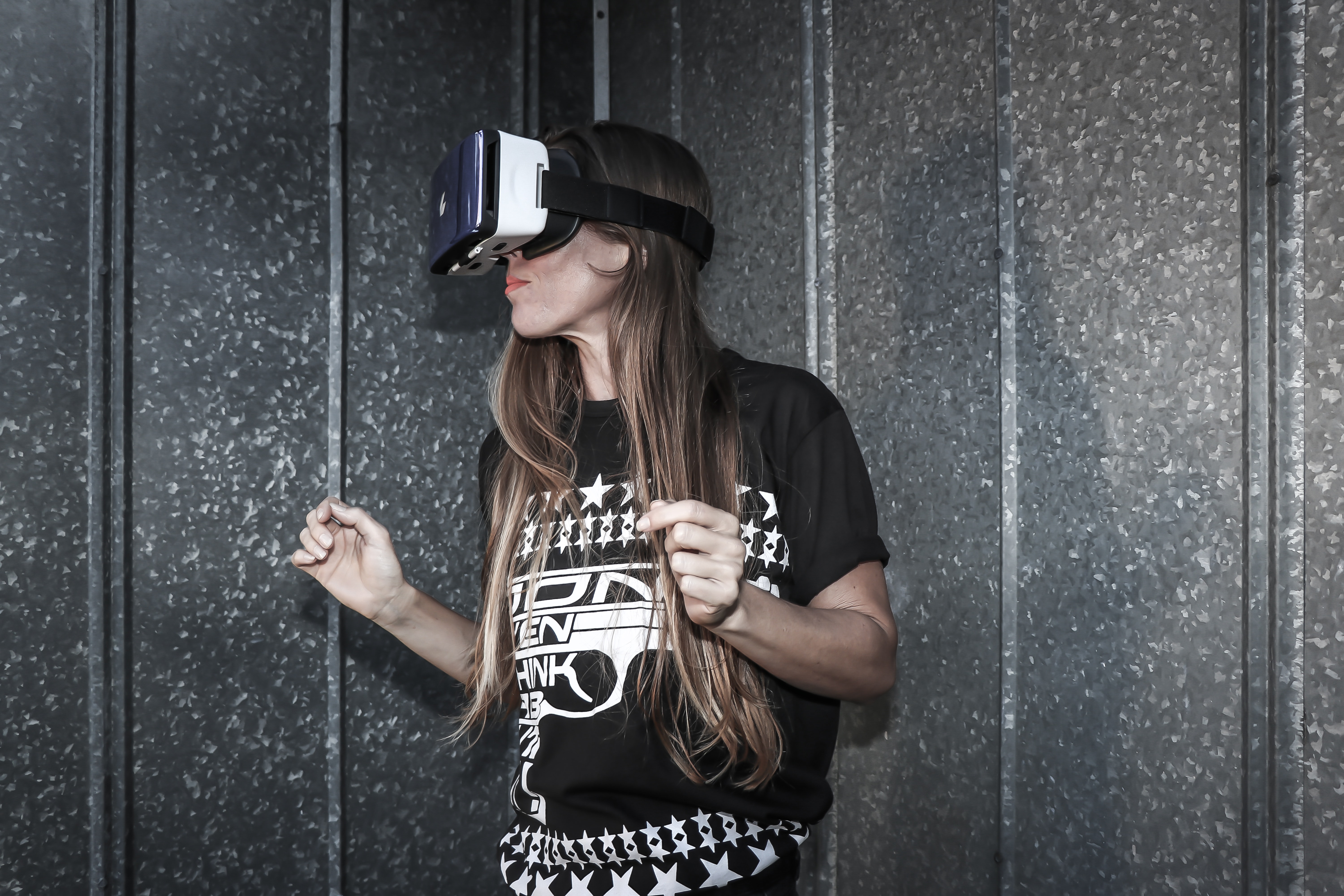 Woman wearing virtual reality glasses photo