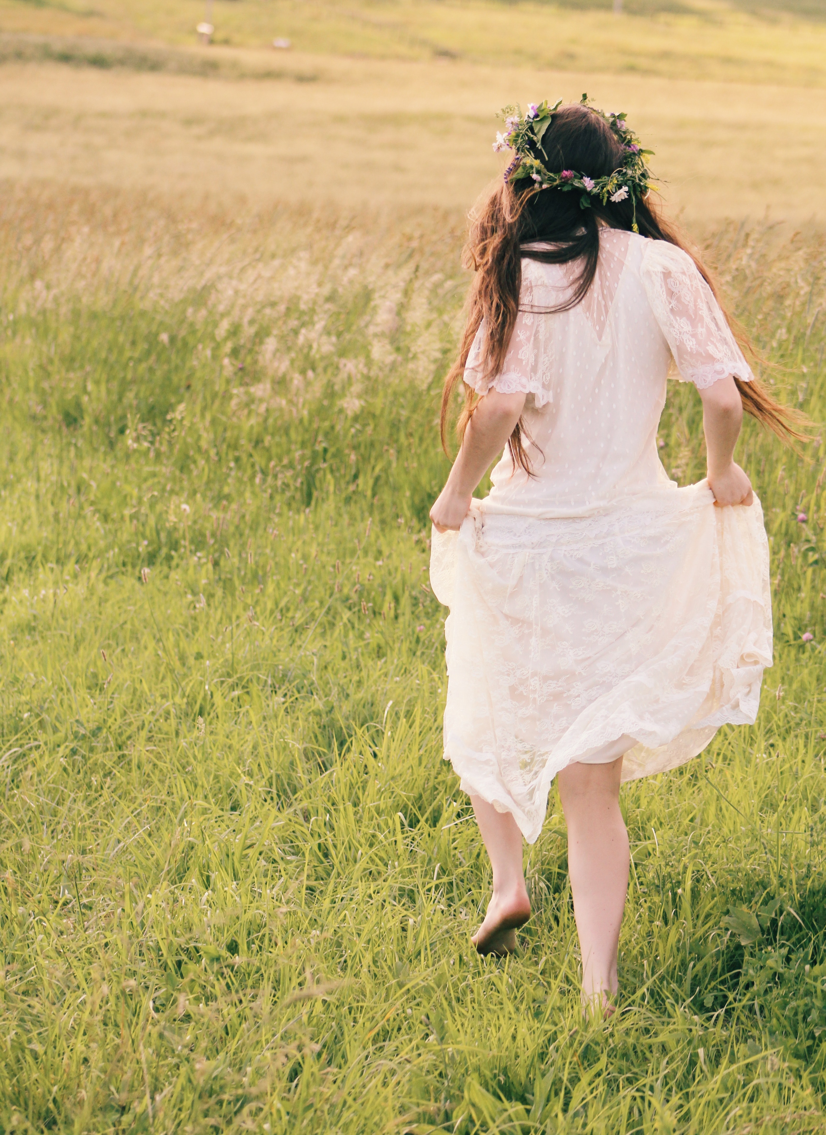 Woman wearing white floral dress photo