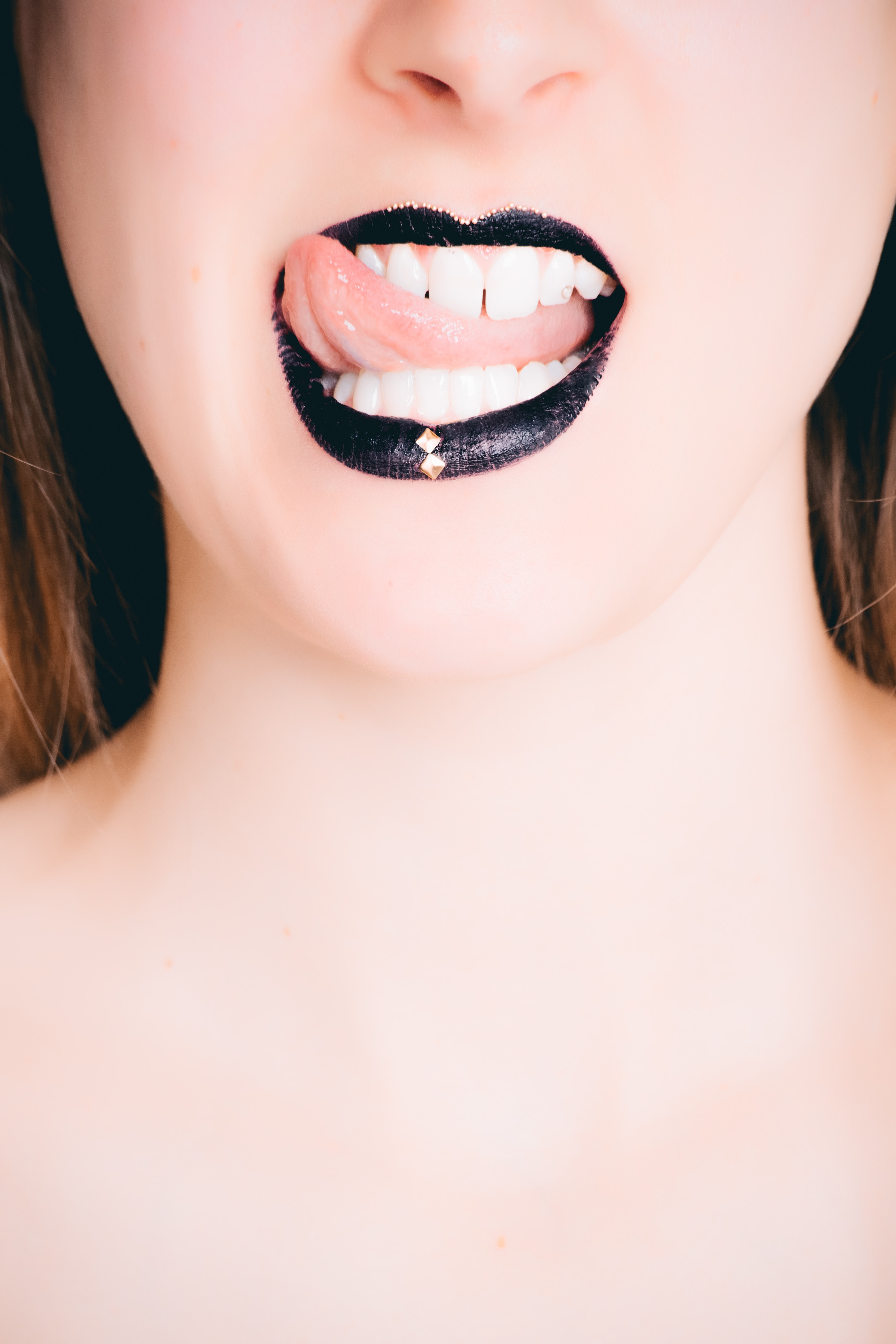 Woman with black lipstick photo
