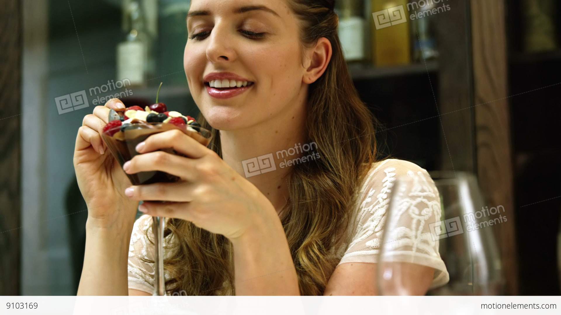 Pretty Girl Eating Chocolate Dessert Stock video footage | 9103169