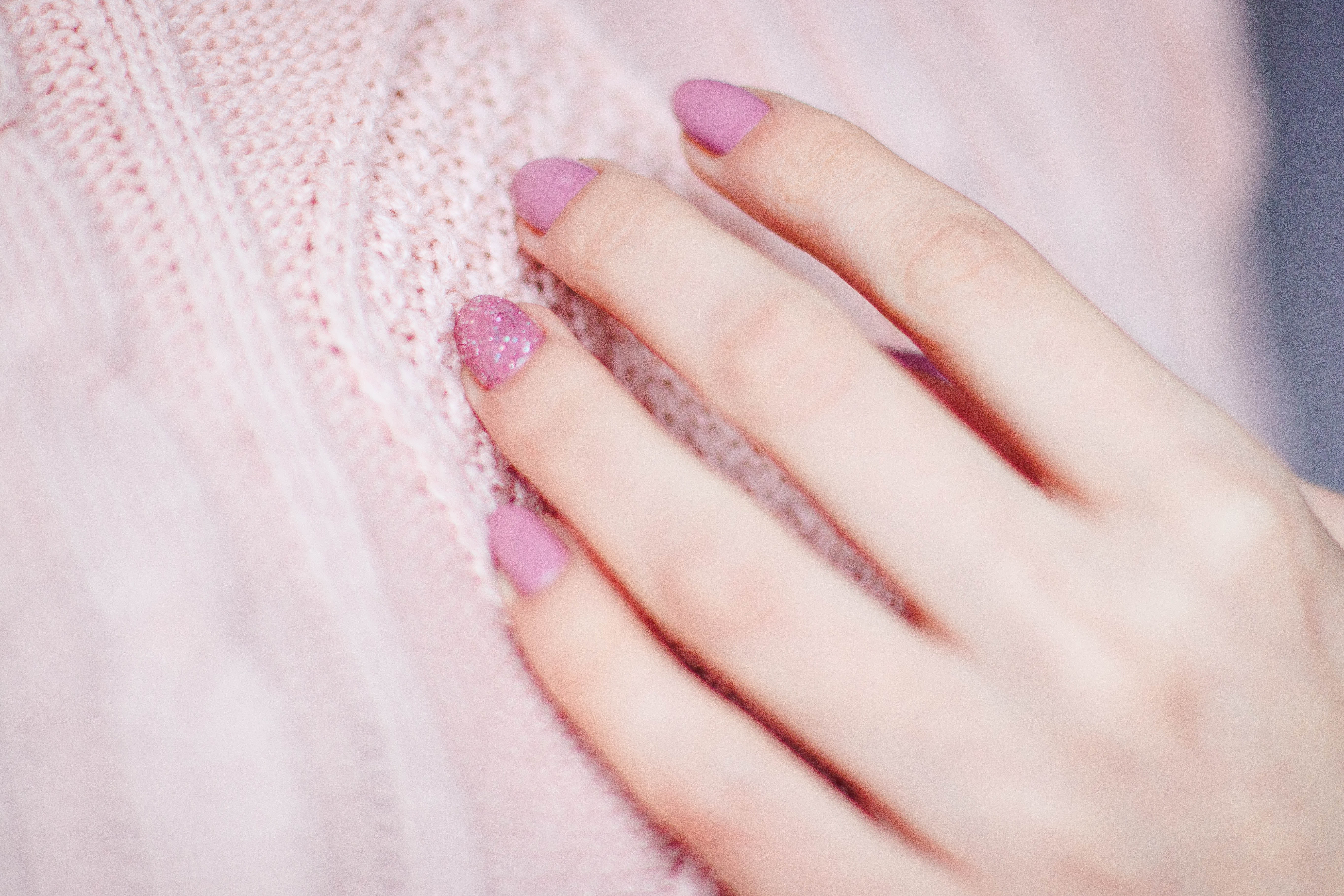 Woman with pink manicure photo