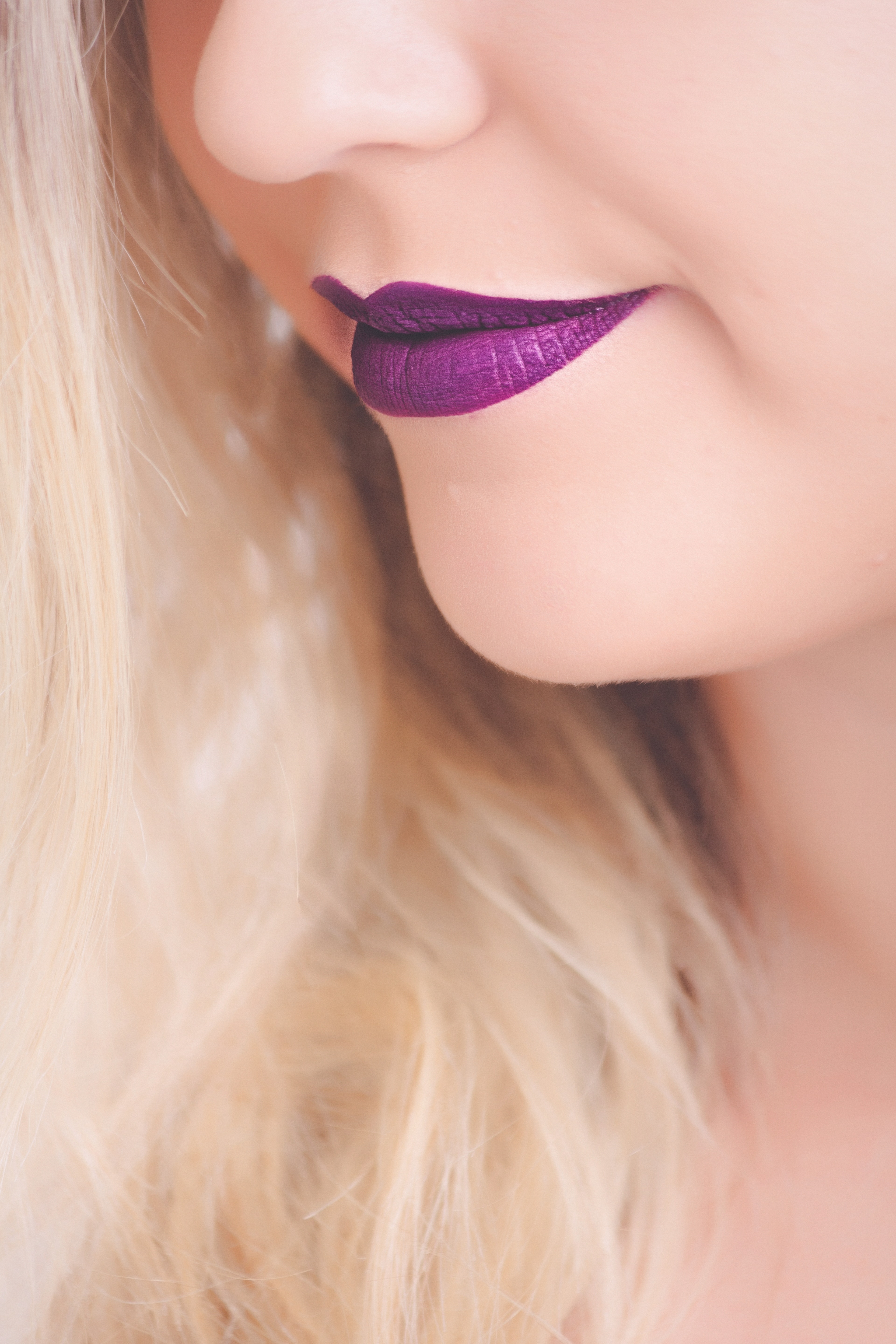 Woman with purple lipstick photo
