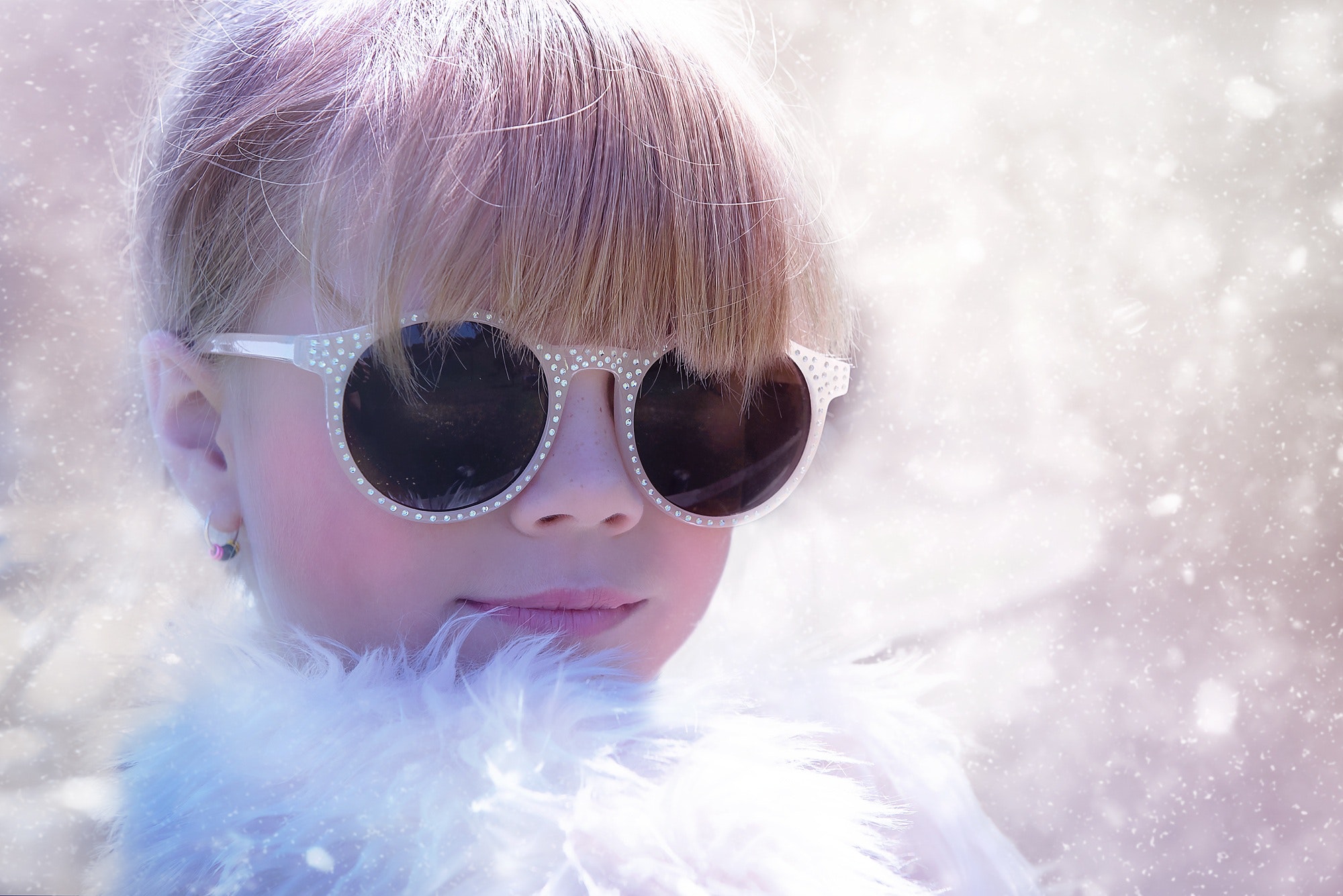 Woman with sunglasses in white fur shirt photo