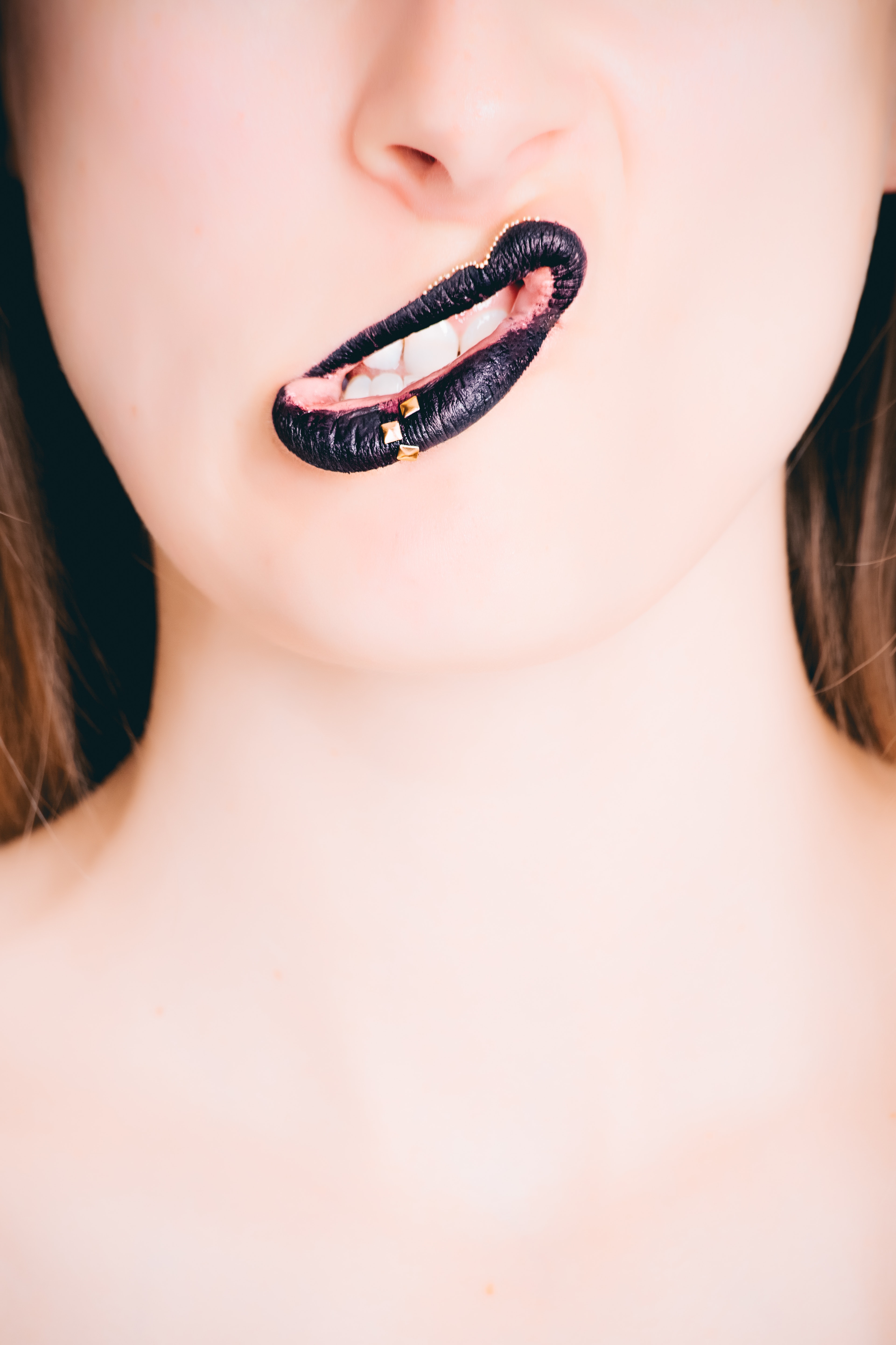 Woman's black lipstick photo