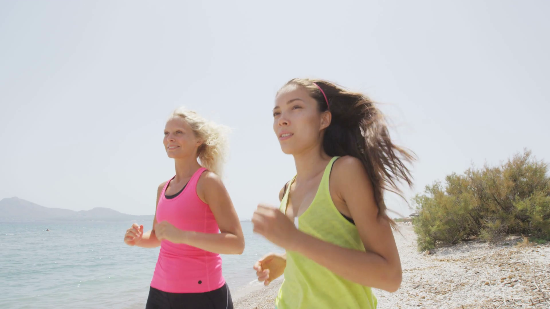 Running women jogging on beach. Girl friends runners exercising ...