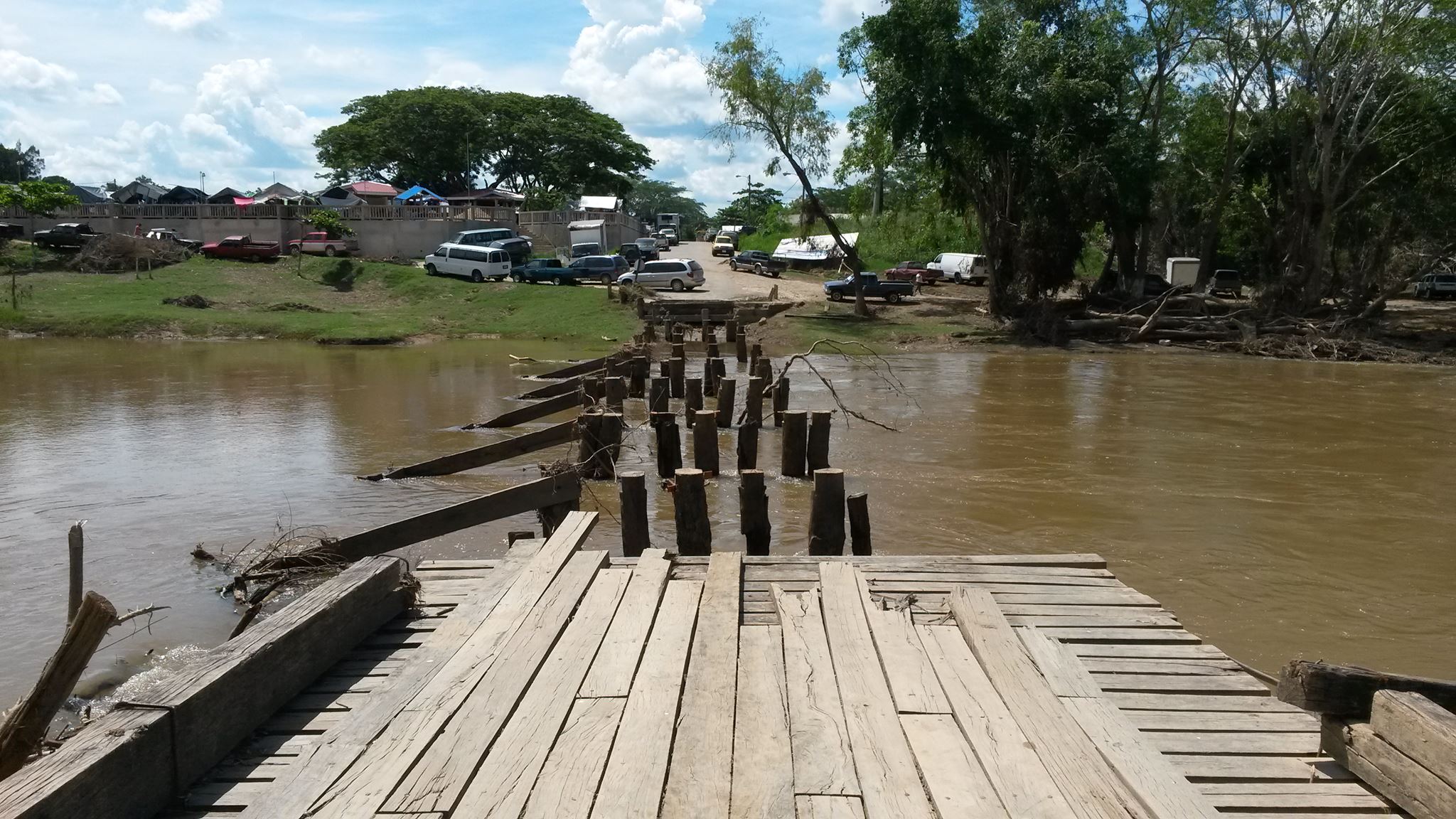 No sign of repairs yet of low lying wooden bridge in San Ignacio
