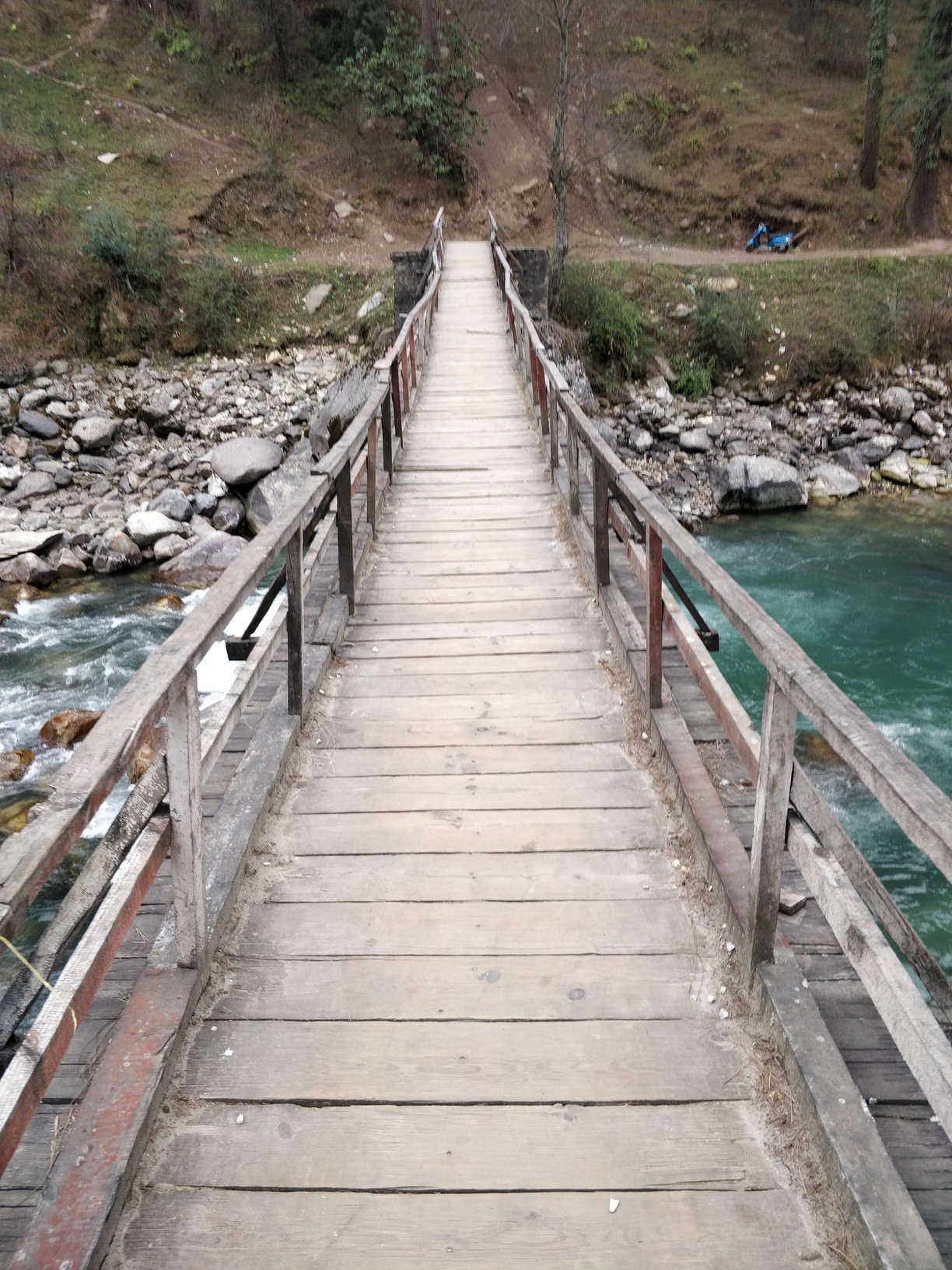 Rasol Pass, Himachal Pradesh, India - A wooden bridge that connects...