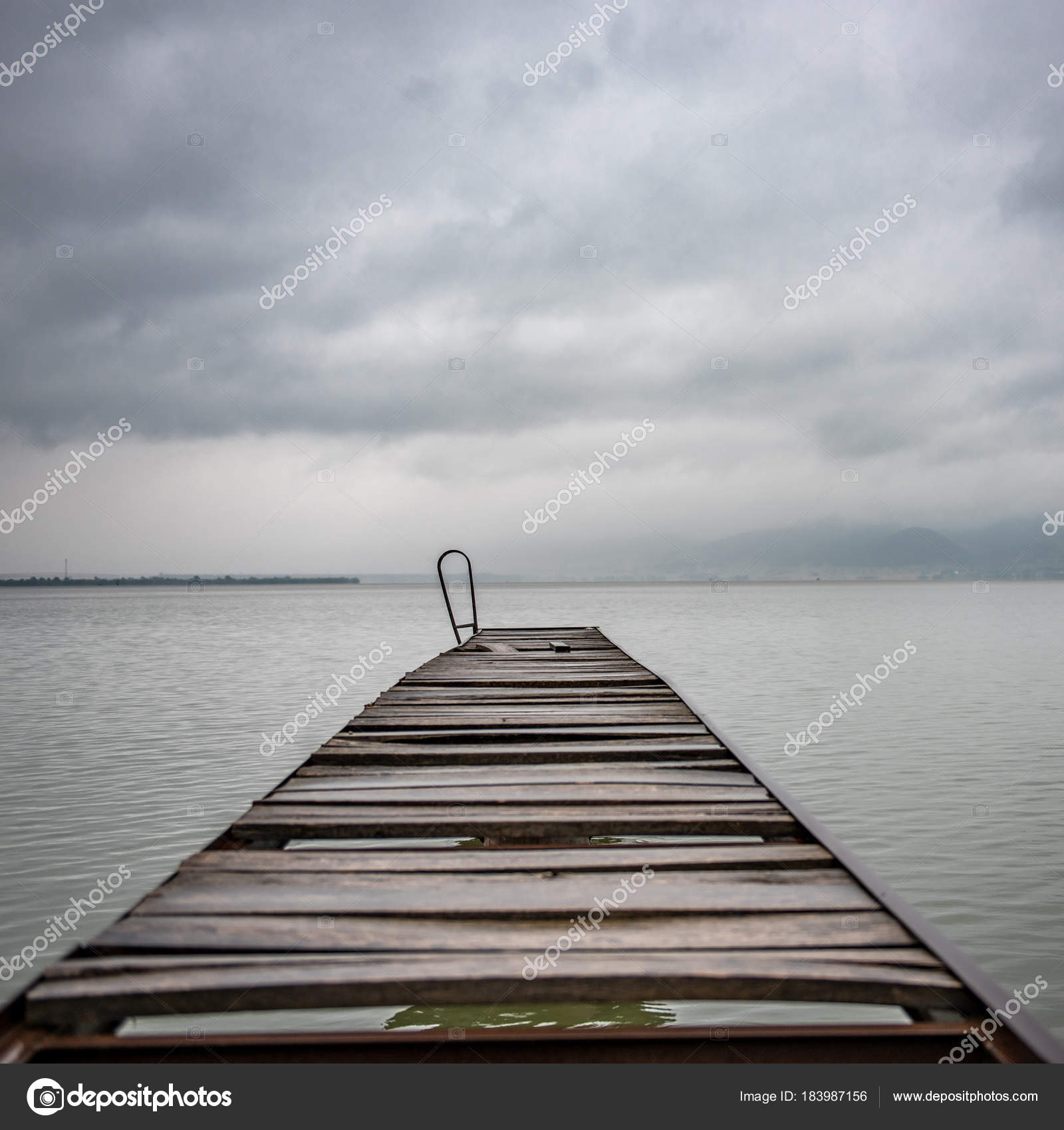 Old Wooden Dock Summer Stormy Weather — Stock Photo © Kerkezz #183987156