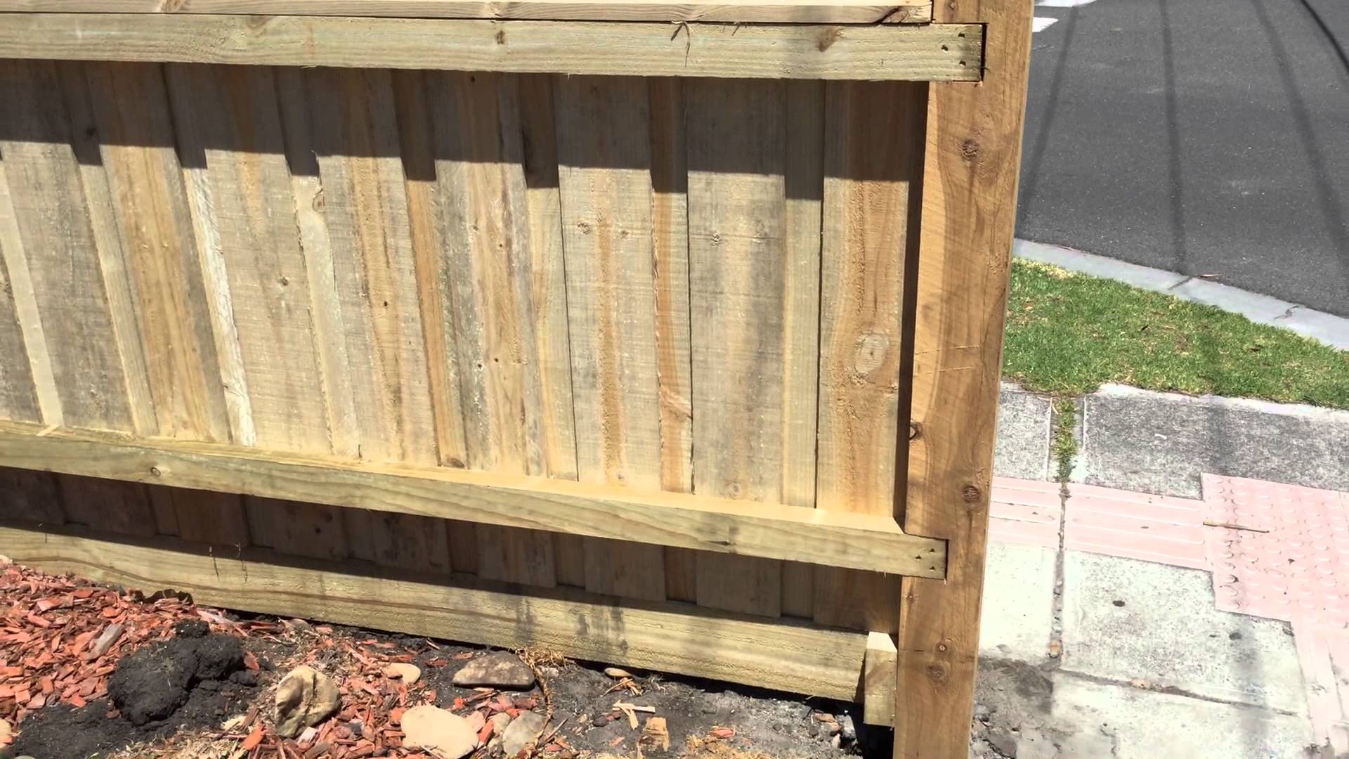 Paling fence with exposed posts and capping - YouTube