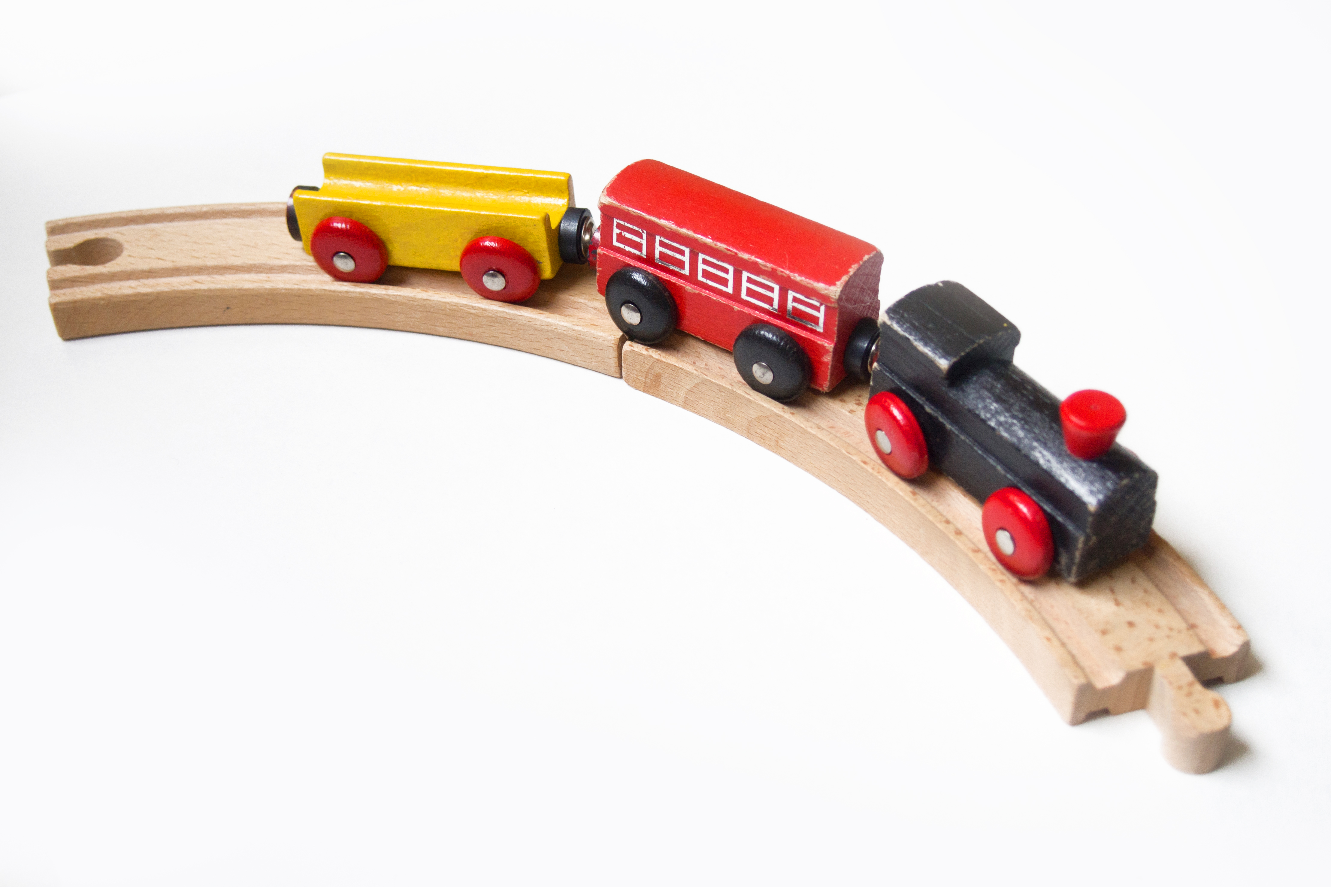 Wooden toy train with wagons photo