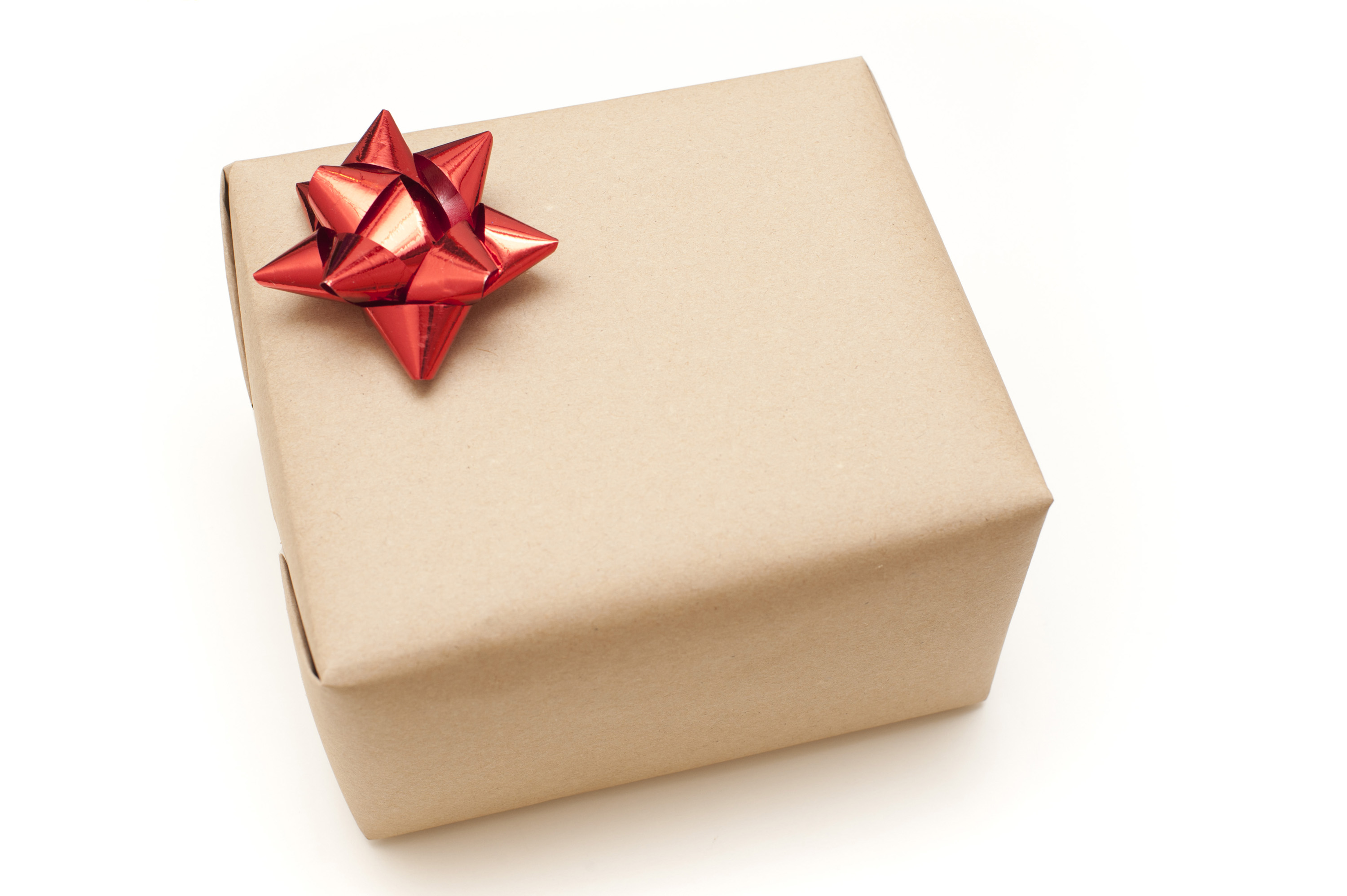 Photo of Plain brown paper wrapped gift box | Free christmas images