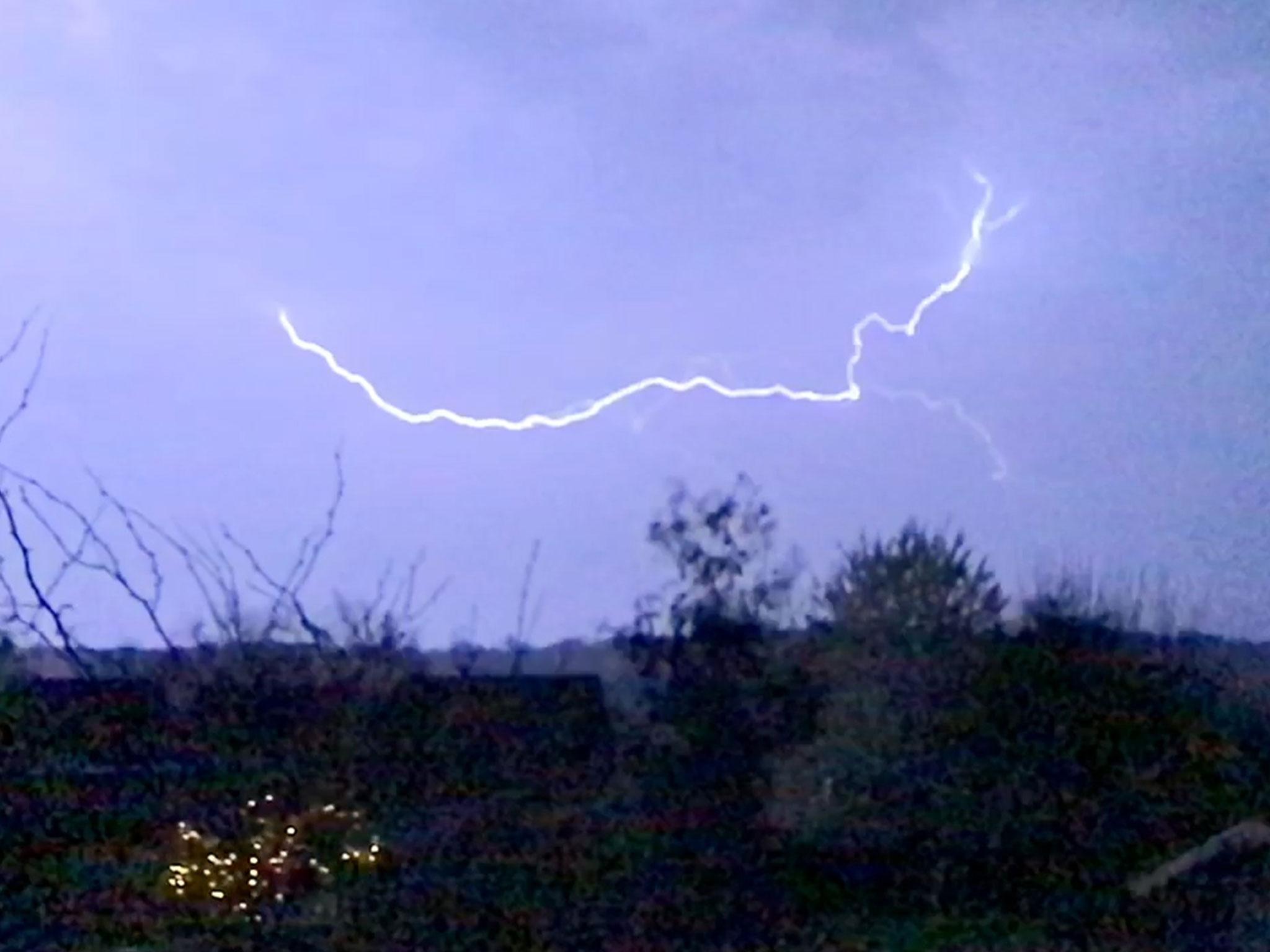UK weather: Watch fork lightning carve through the sky in overnight ...