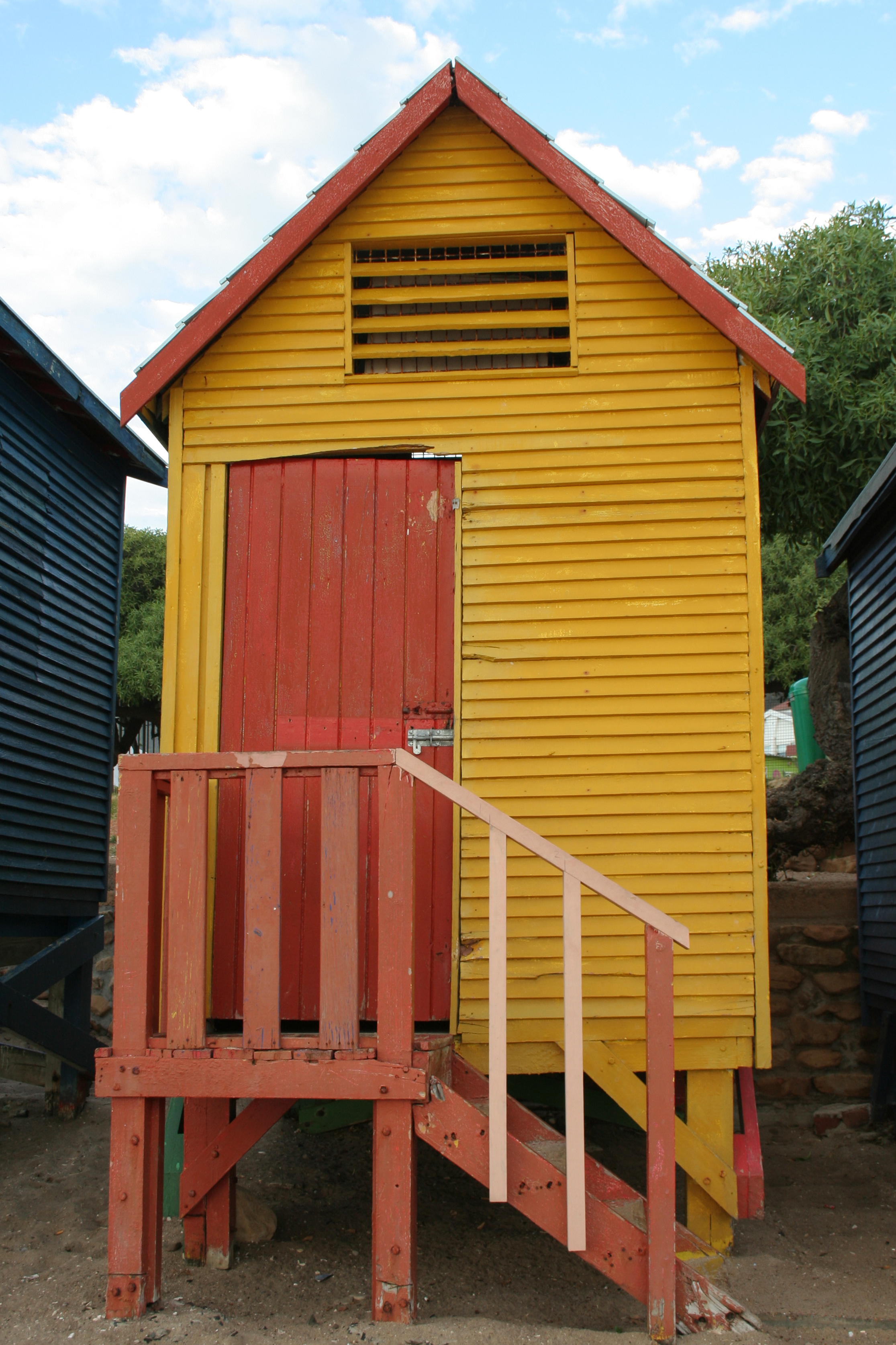 Yellow cabin on the beach. photo