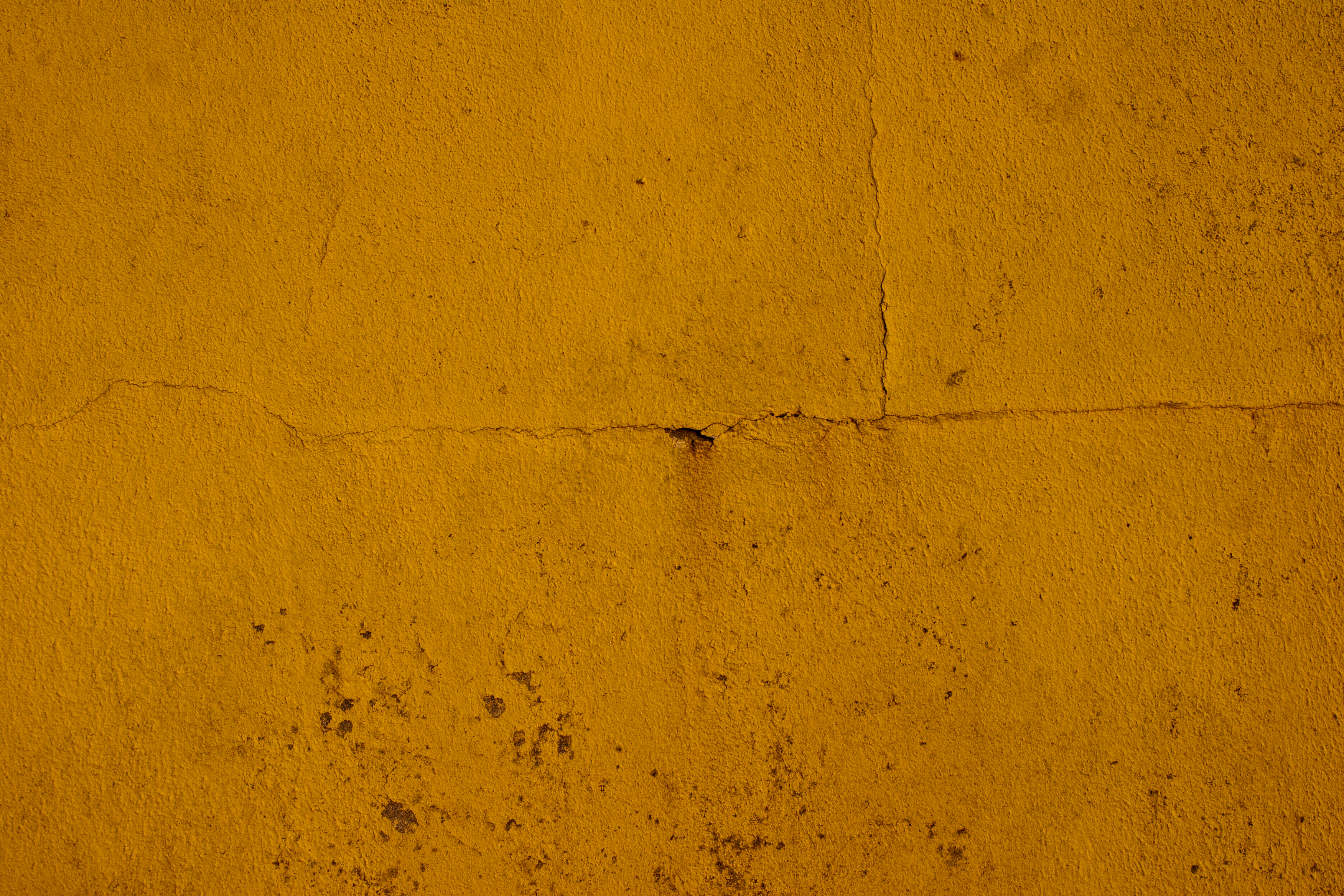 Yellow grunge wall texture photo
