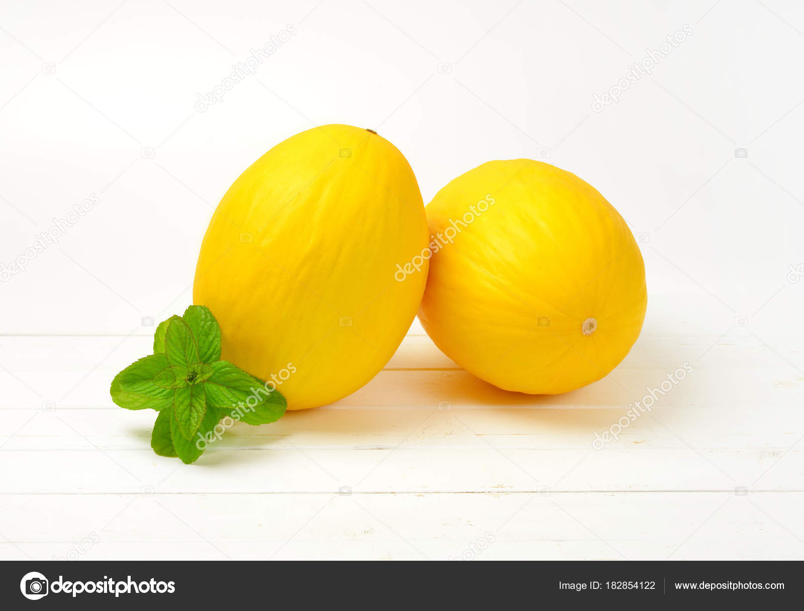 two whole yellow melons — Stock Photo © ajafoto #182854122