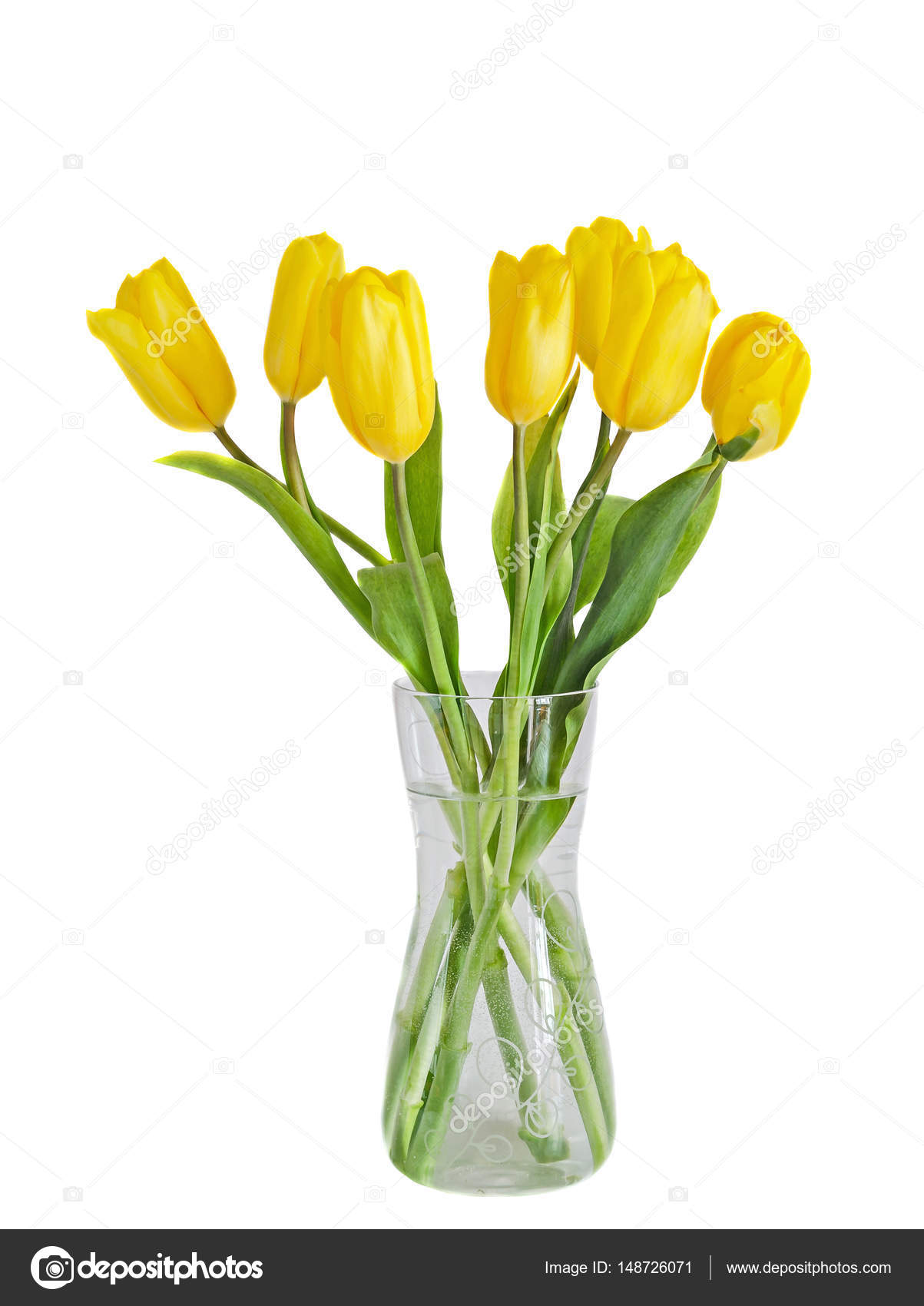 Yellow tulips flowers, transparent vase — Stock Photo © ncristian ...