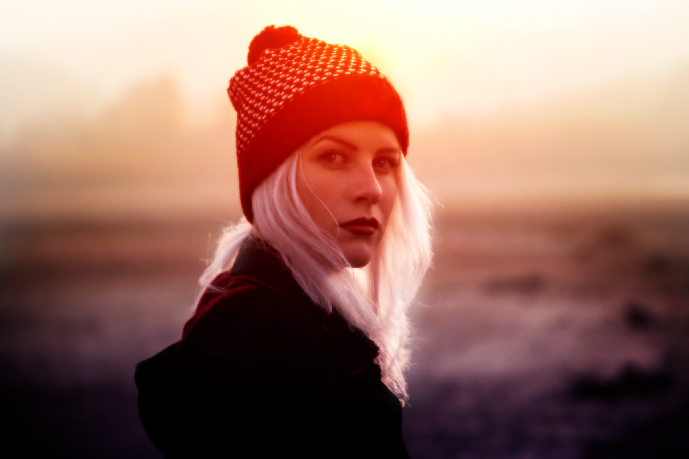 Young blond woman with beanie in winter photo