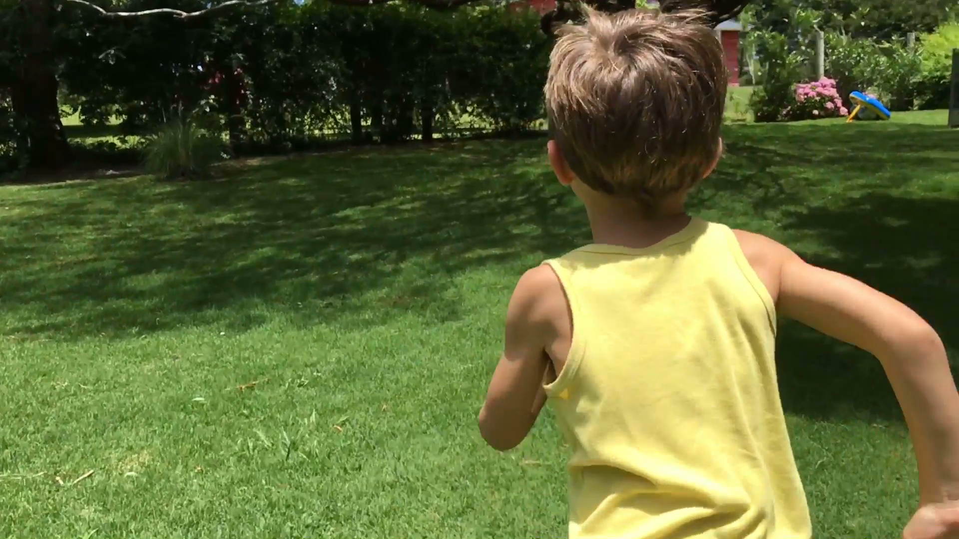 Handsome young boy running in slow motion outside. 5 year old kid ...