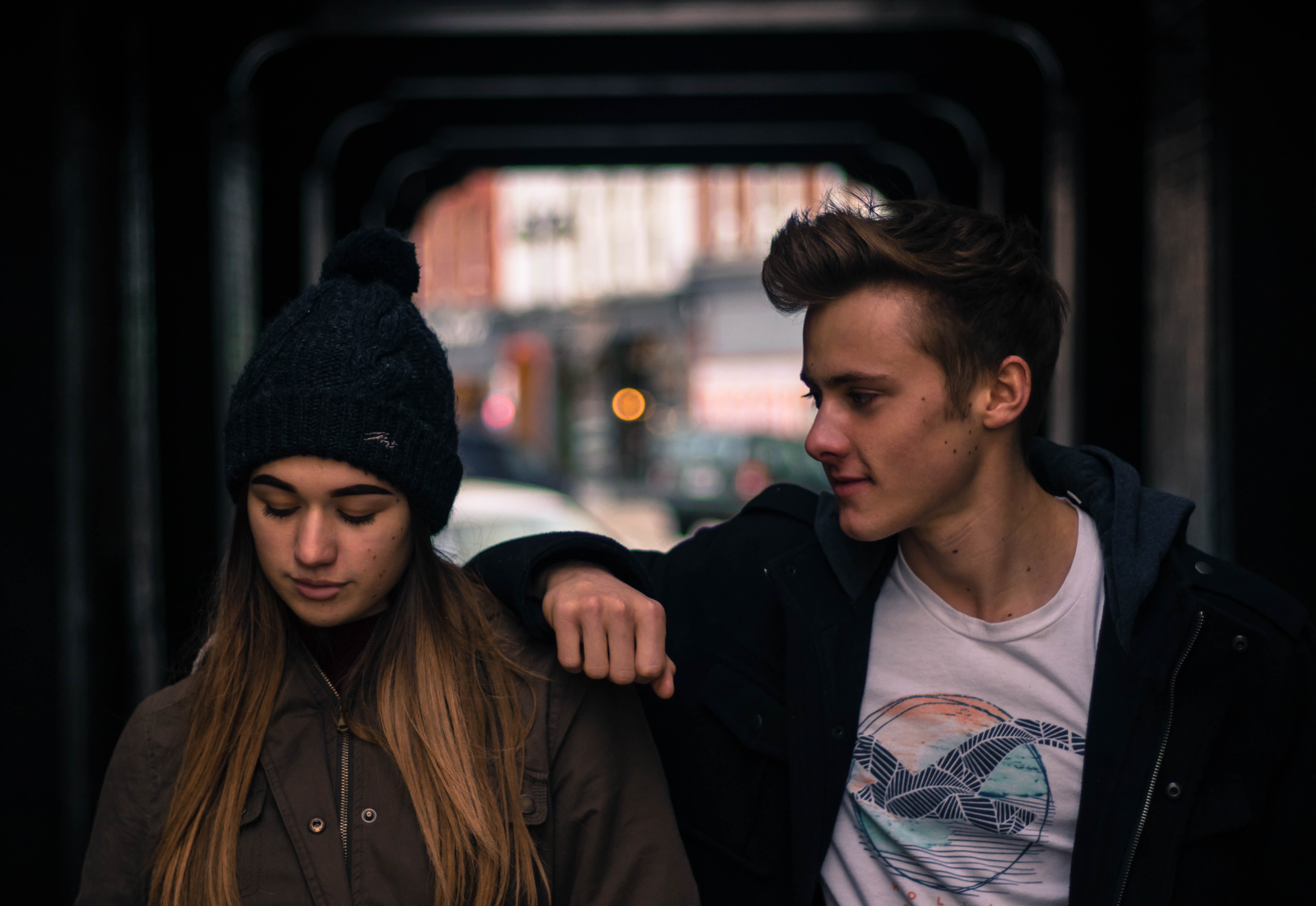 Young couple in city at night photo