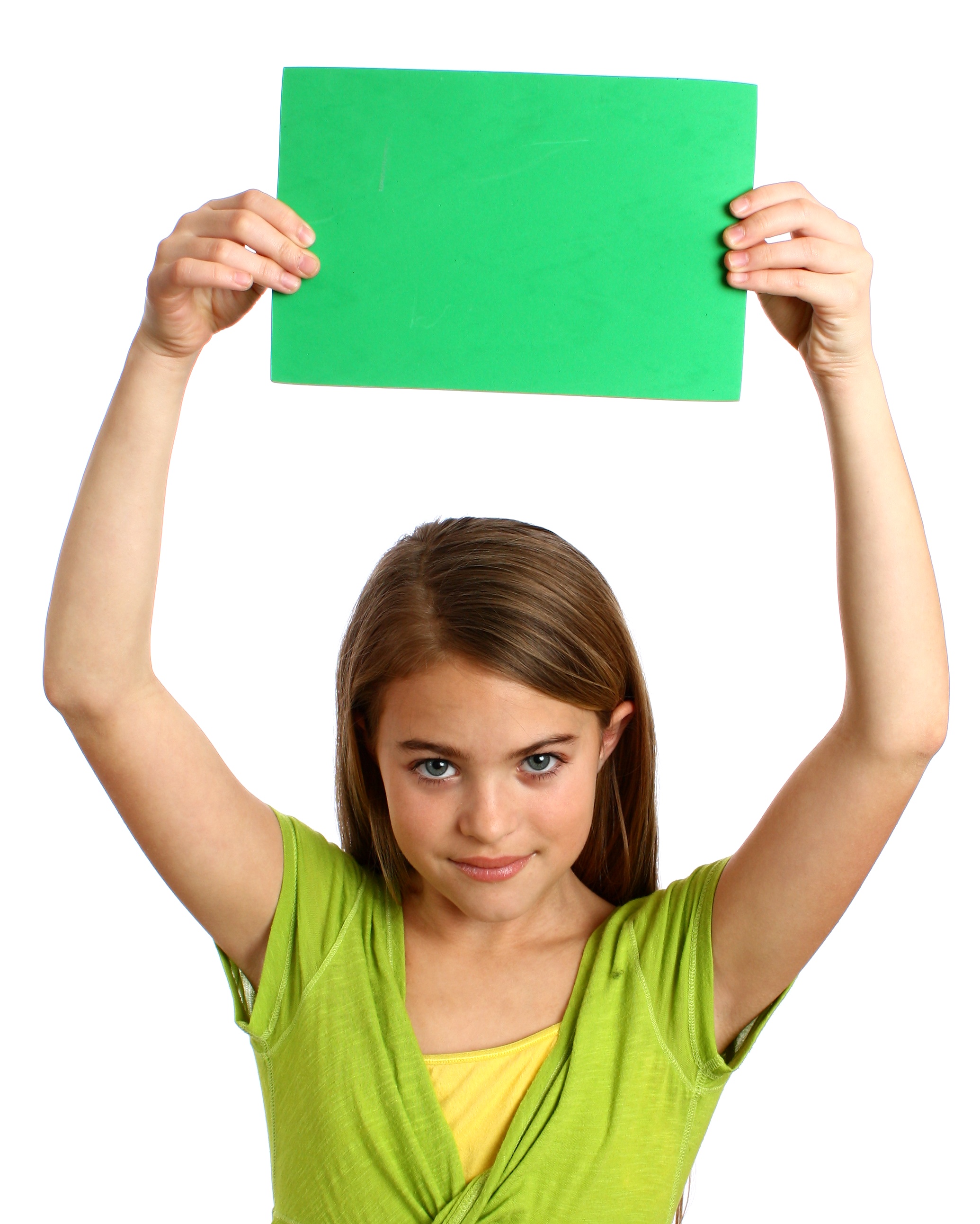Young girl holding a blank green sign photo