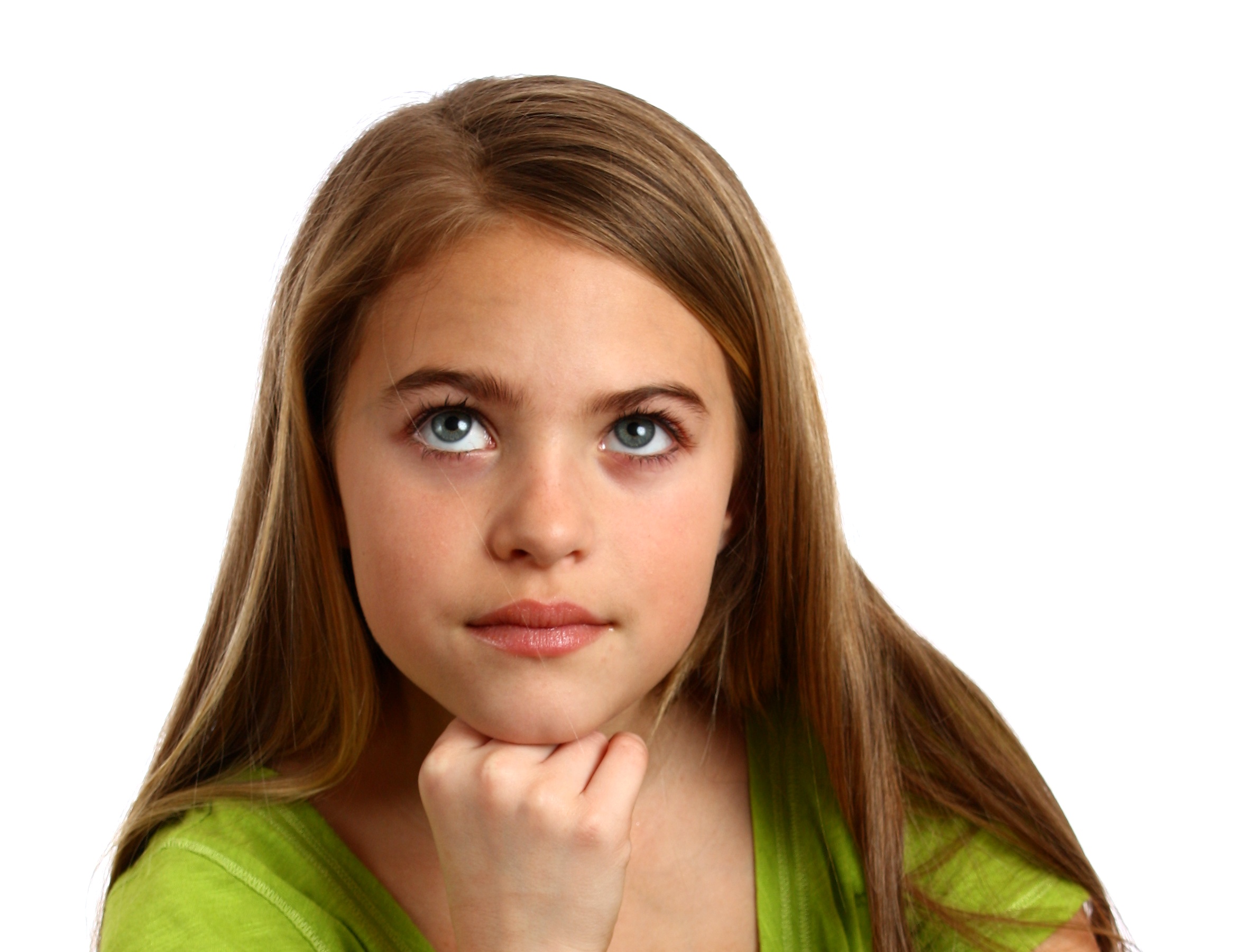 Young girl with a thoughtful expression photo