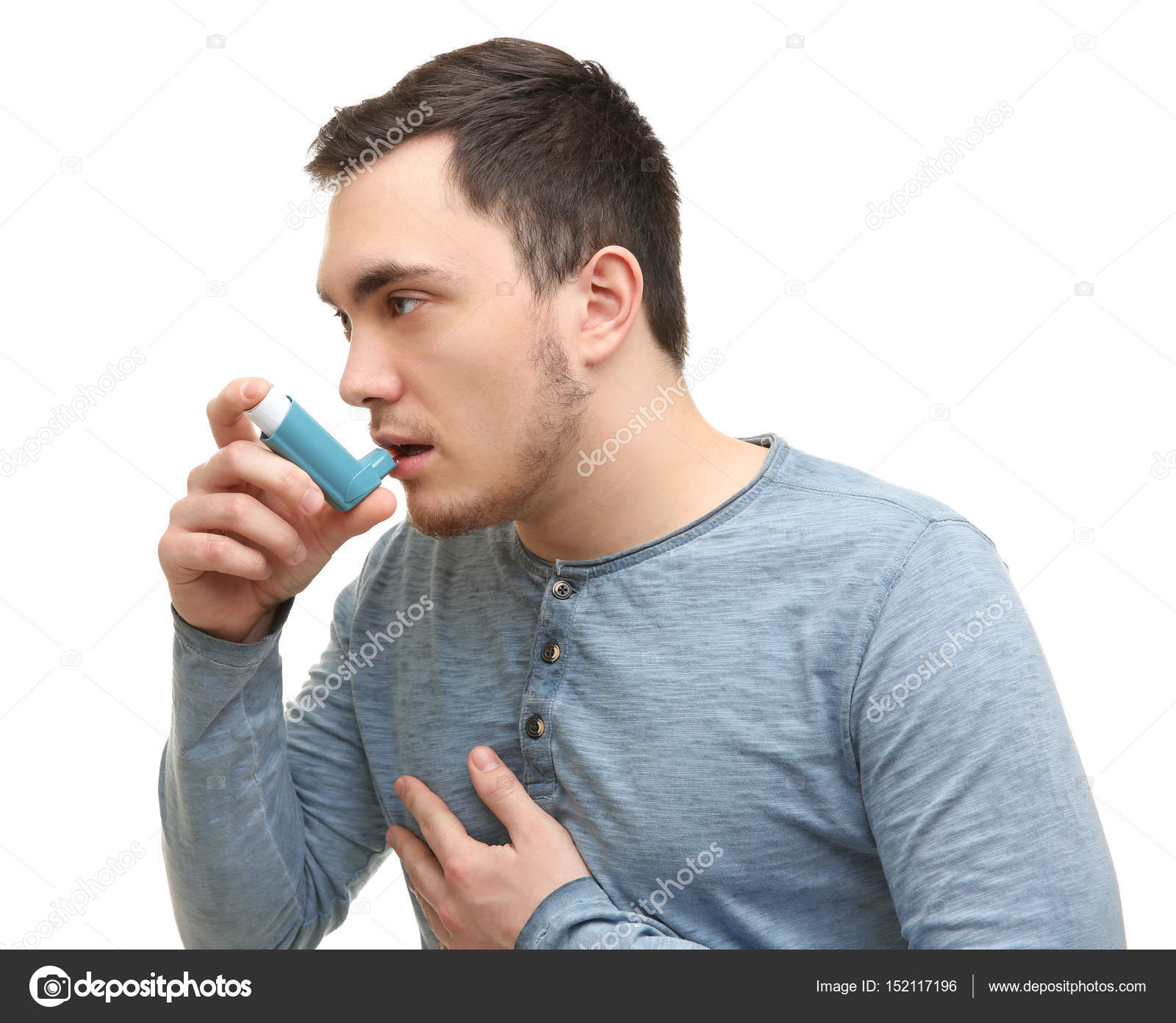 Young man using inhaler — Stock Photo © belchonock #152117196