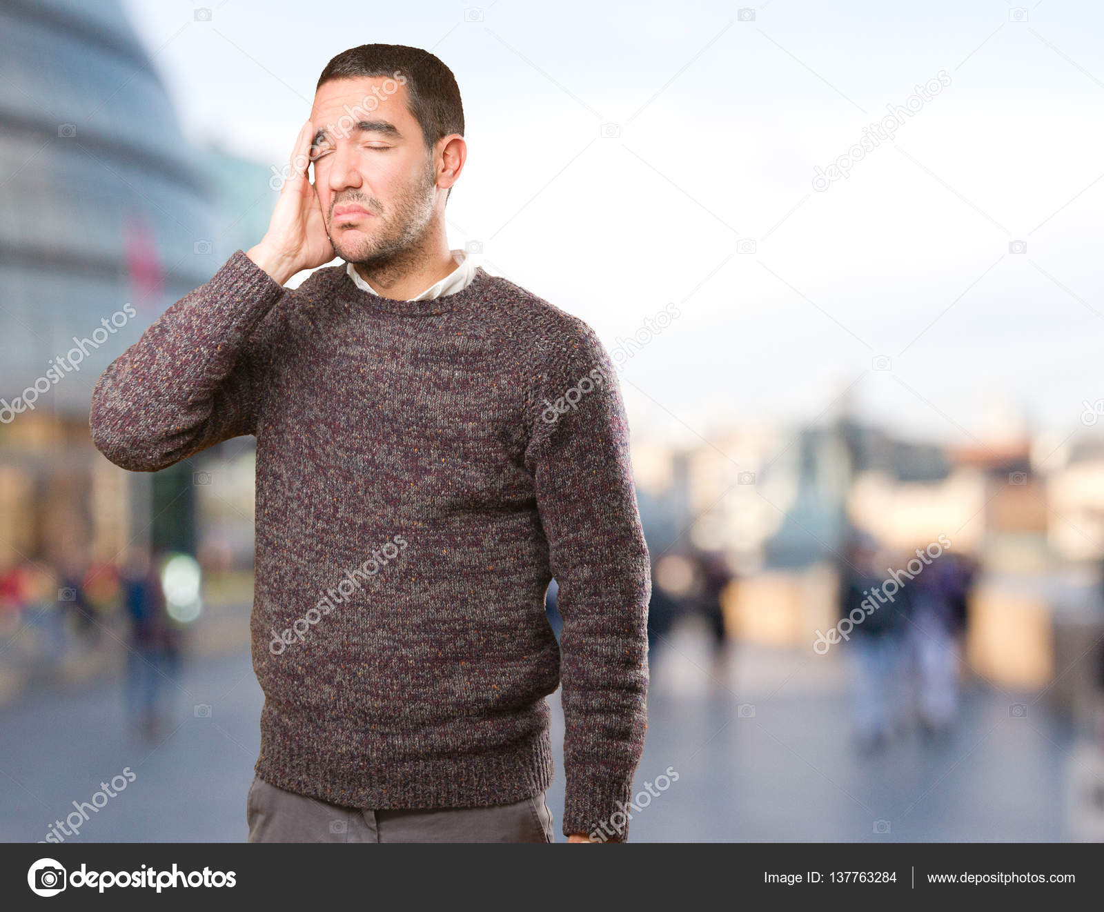 Stressed young man posing — Stock Photo © agongallud #137763284