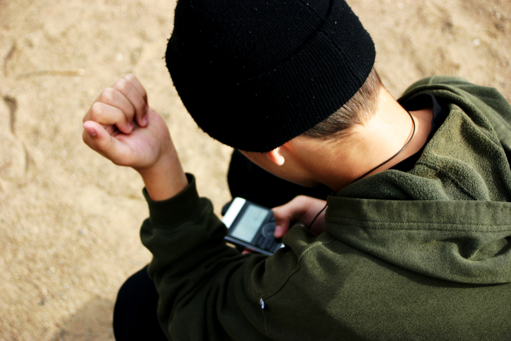 Young man with mobile device photo