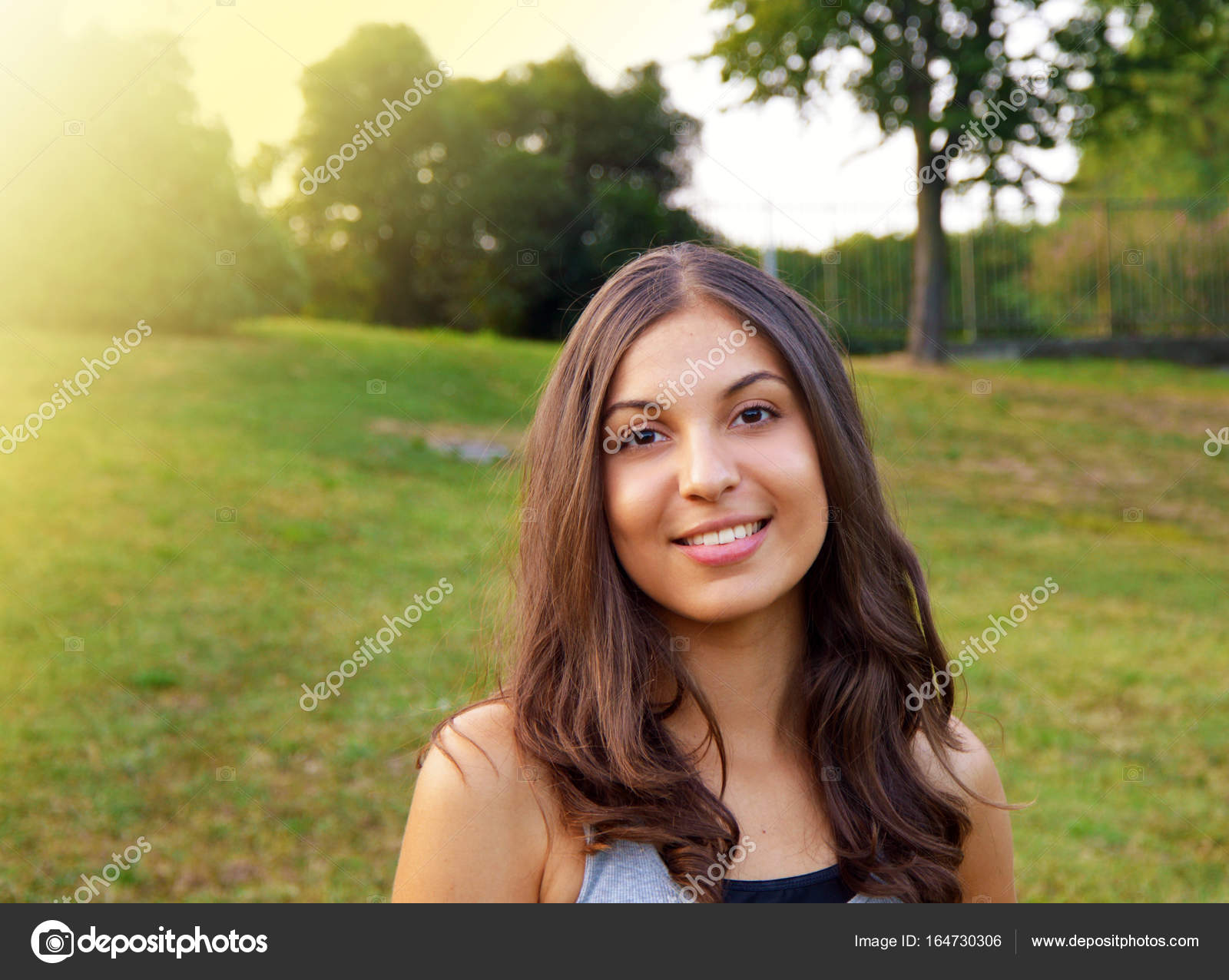 Summer girl sunshine portrait. Young woman smiling happy on sunny ...