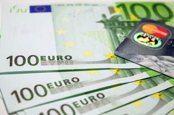 100 Euro Bills Beside Mastercard