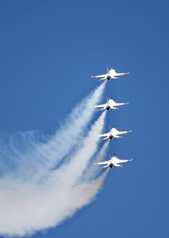 4 White Jet Flying on Sky at Daytime