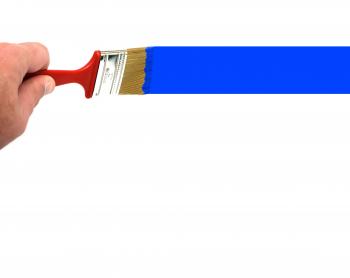A hand painting a blue line with a paint