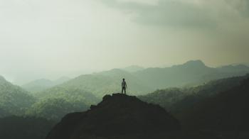 Photo of Man on Hilltop