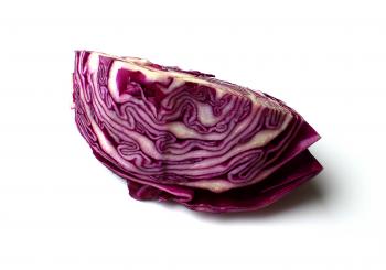 A slice of red cabbage on white