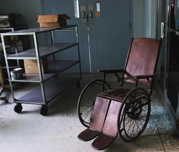 Awesome Old Wooden Wheelchair in Abandoned Hospital (OC) : abandoned