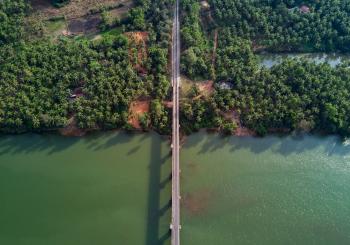 Aerial Photography of Gray Bridge over Body of Water
