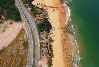 Aerial View of Road Beside the Seashore