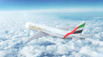 Boeing 777 commercial passenger aircraft flying high up in the sky ...