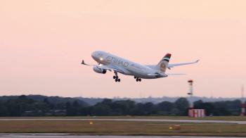 plane takes off at sunset etihad airways airbus a330 Stock Video ...