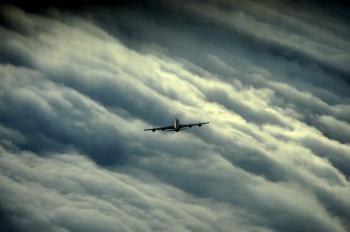 Airplane over the Clouds