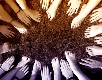 All Together - People Joining Hands and Feet in a Circle