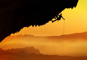 Alpinist - Silhouette at dawn