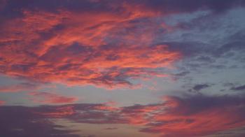 Wonderful sky in the evening with amazing colorful clouds bright red ...
