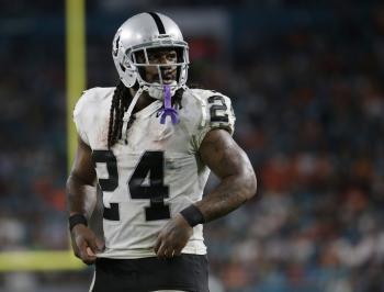 Marshawn Lynch enjoying teaching foreign kids football