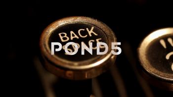 Typing backspace key on vintage typewriter ~ Clip #78952337