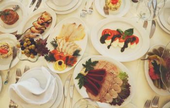 Assorted Dishes Served on White Ceramic Oval Plate on the Table