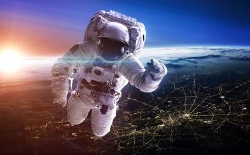 Astronaut in outer space. Spacewalk. Elements of this image ...