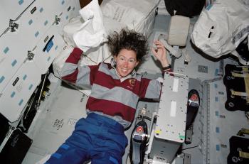 Astronaut Washing Hair